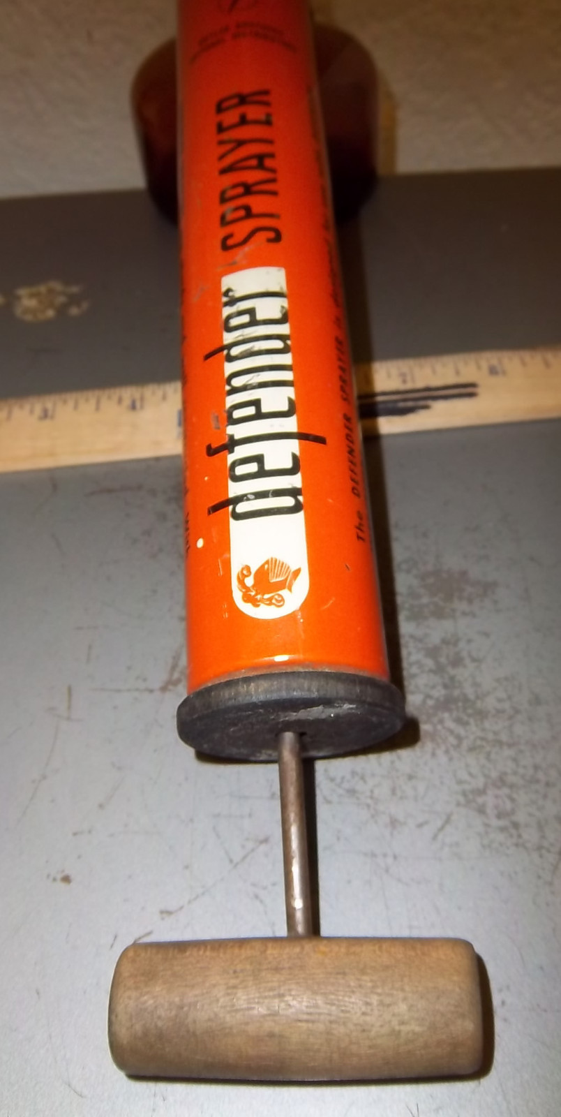 vintage Defender sprayer, wood handle & amber glass container, great colors!!