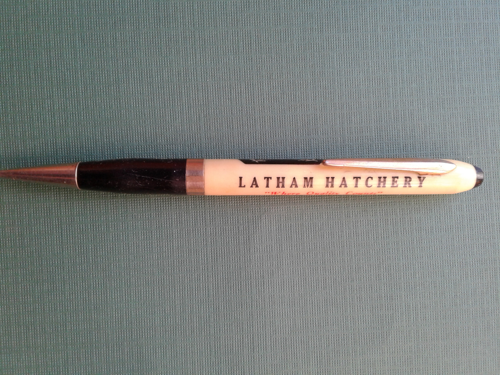 Collectible Cairo, Ne. advertising agriculture Latham Hatchery pencil.