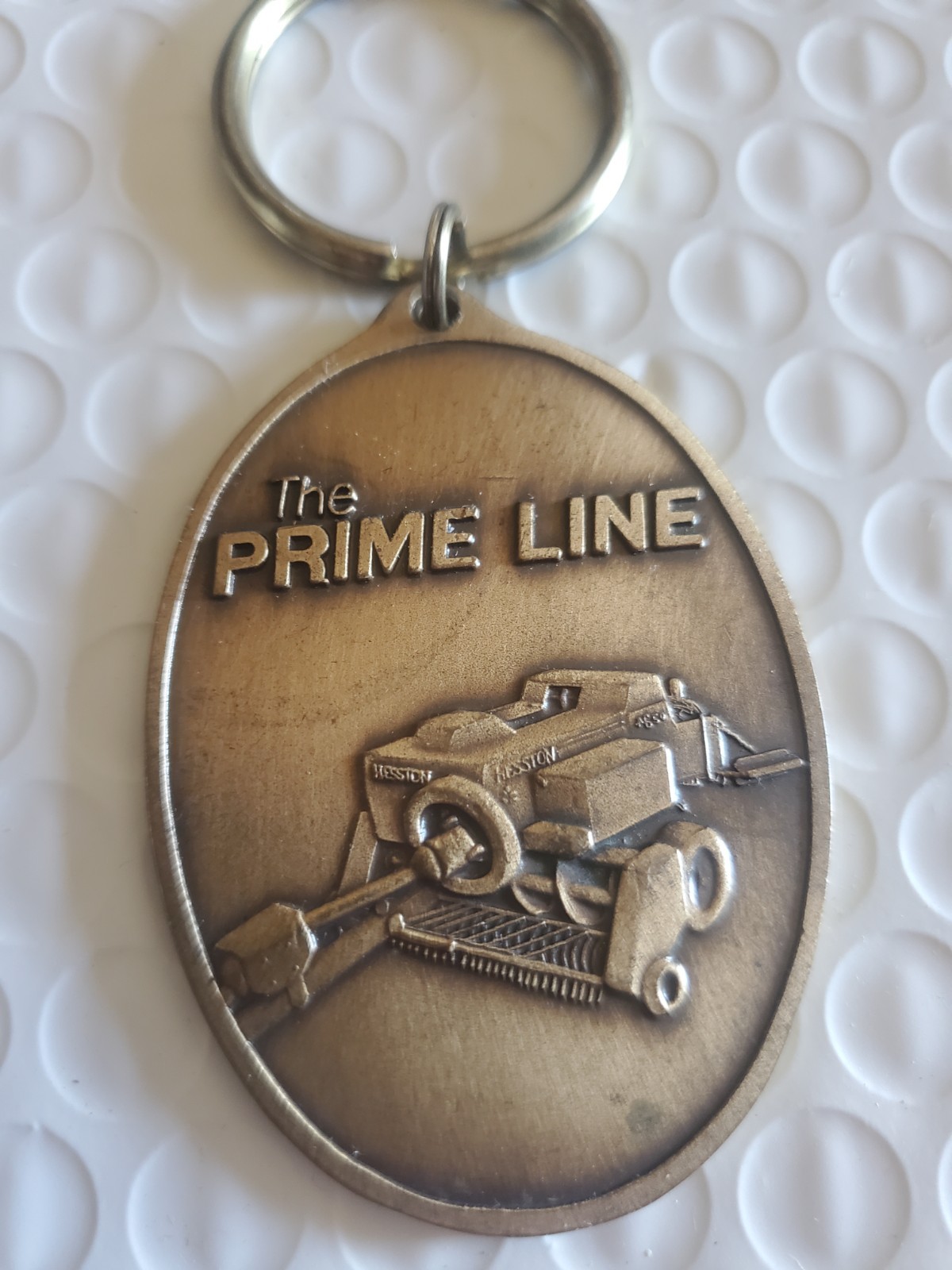 Vintage 1986 Hesston’s The Prime Line Equipment Key Chain vtg.