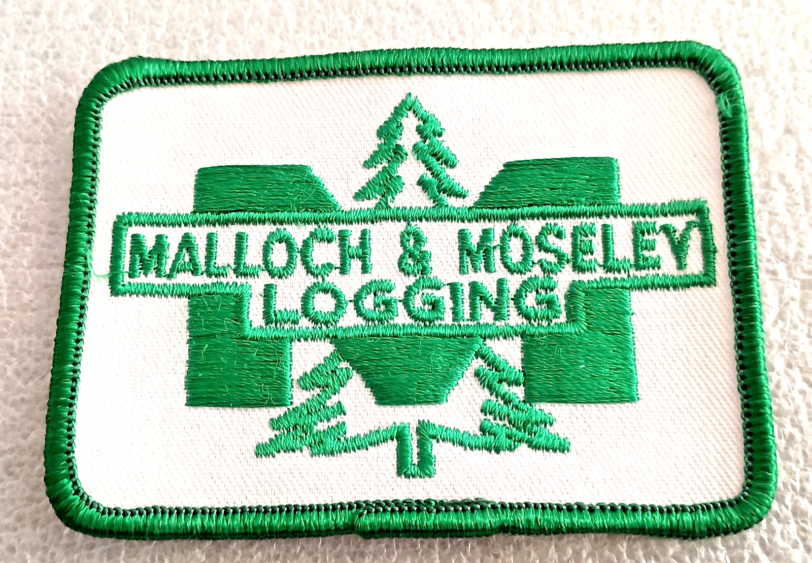VTG Malloch & Moseley Logging Co. Canadian Cloth Jacket Hat Patch New NOS 1970s