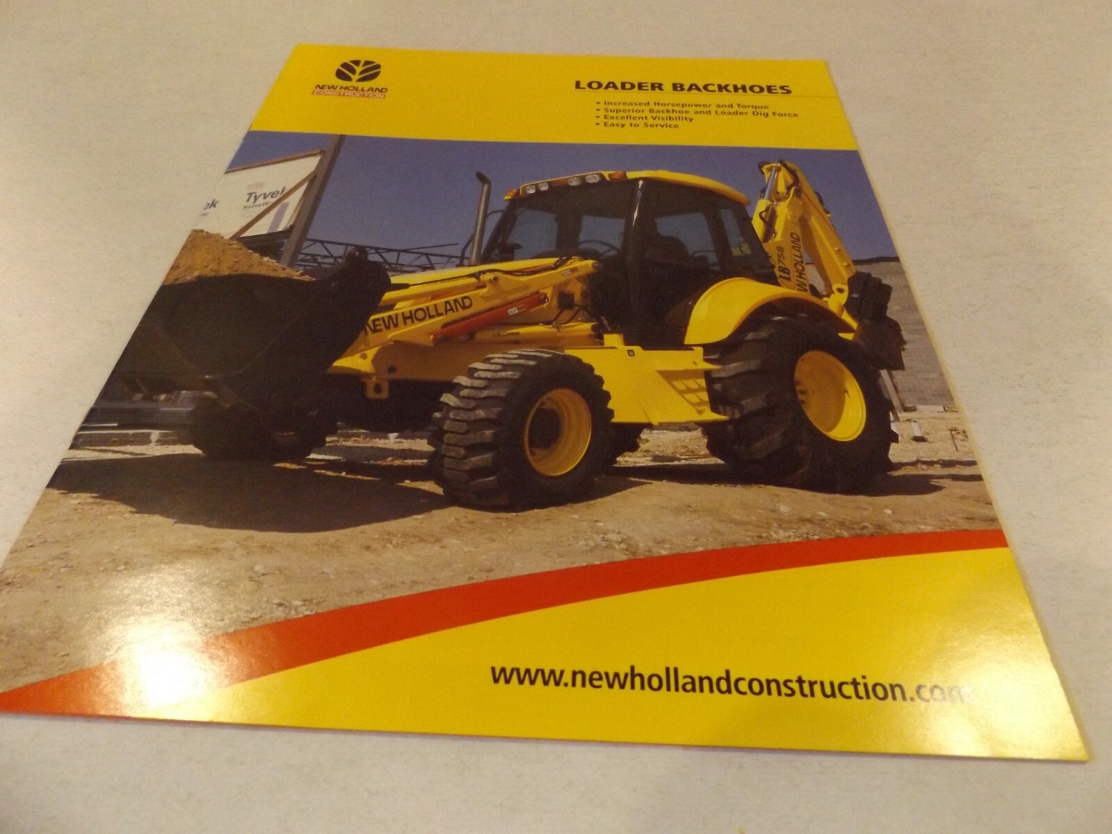 2003 NEW HOLLAND CONSTRUCTION LOADERS BACKHOES. LIT # NHC7100303 070320