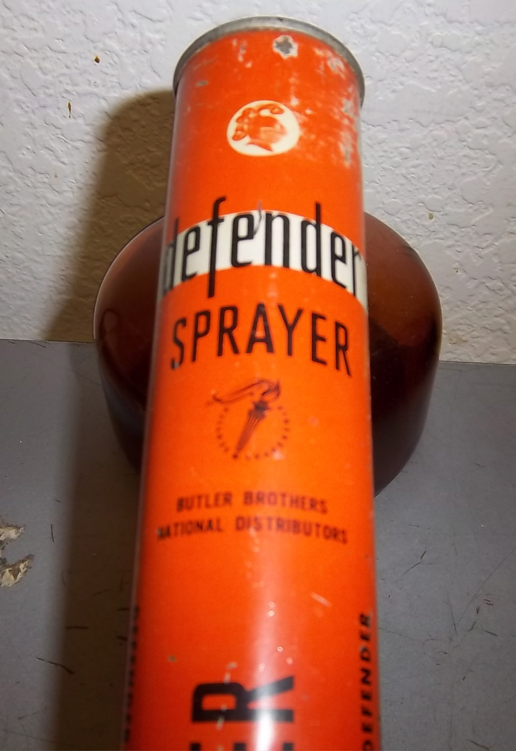 vintage Defender sprayer, wood handle & amber glass container, great colors!!
