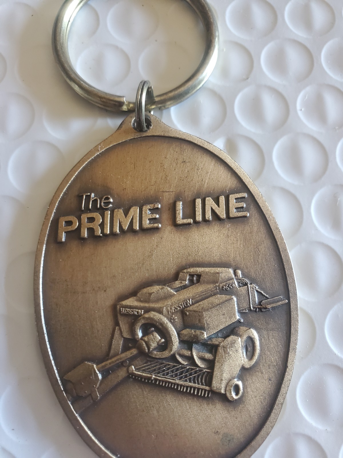 Vintage 1986 Hesston’s The Prime Line Equipment Key Chain vtg.