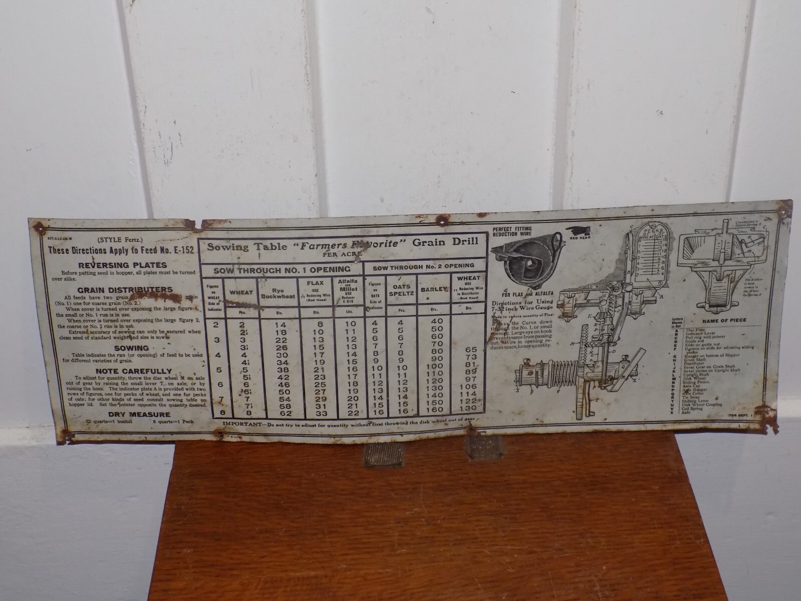 Vintage Grain Drill Sewing Table Tin Sign
