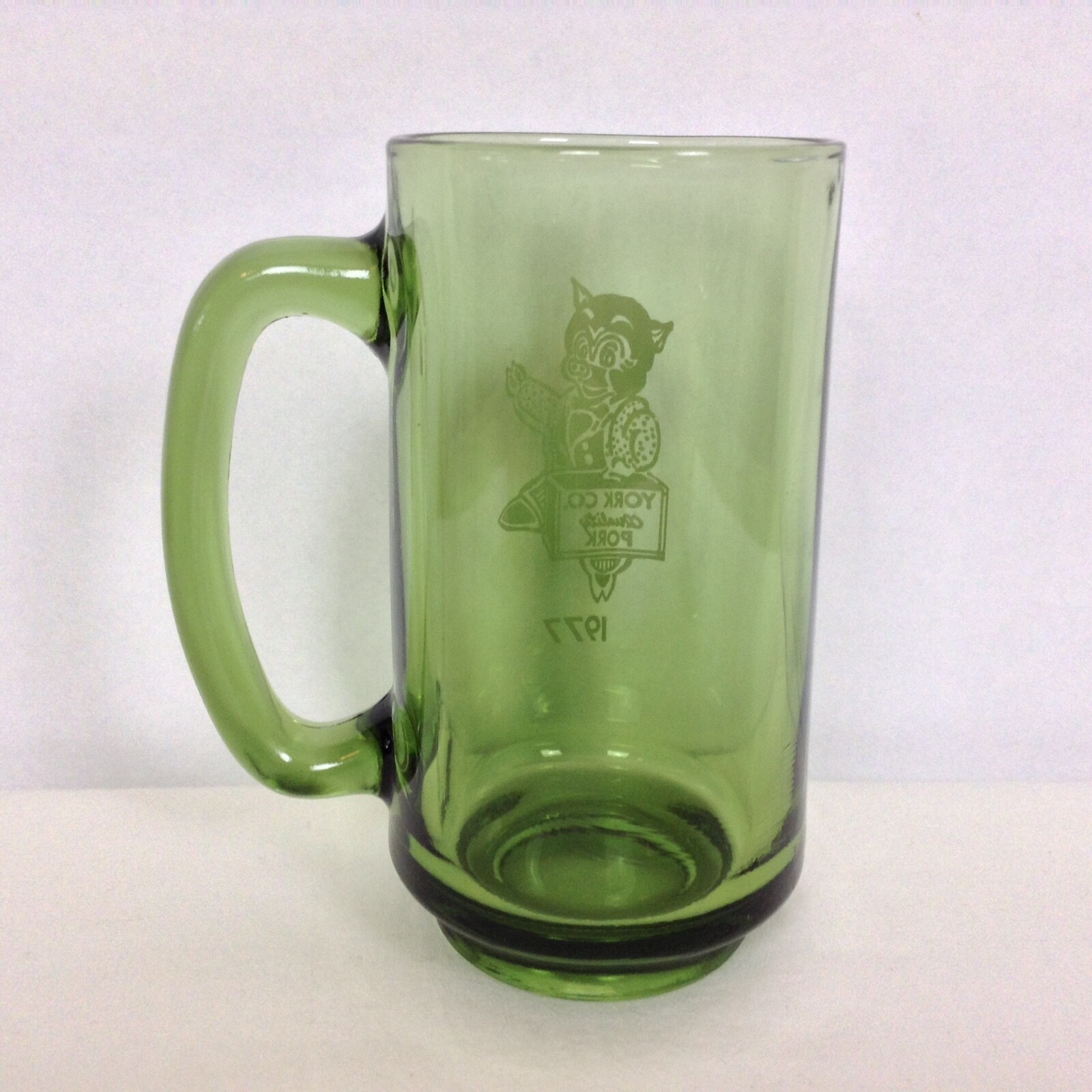 Vintage 1977 York Co Quality Pork PIG in a Suit Green Glass York Pennsylvania