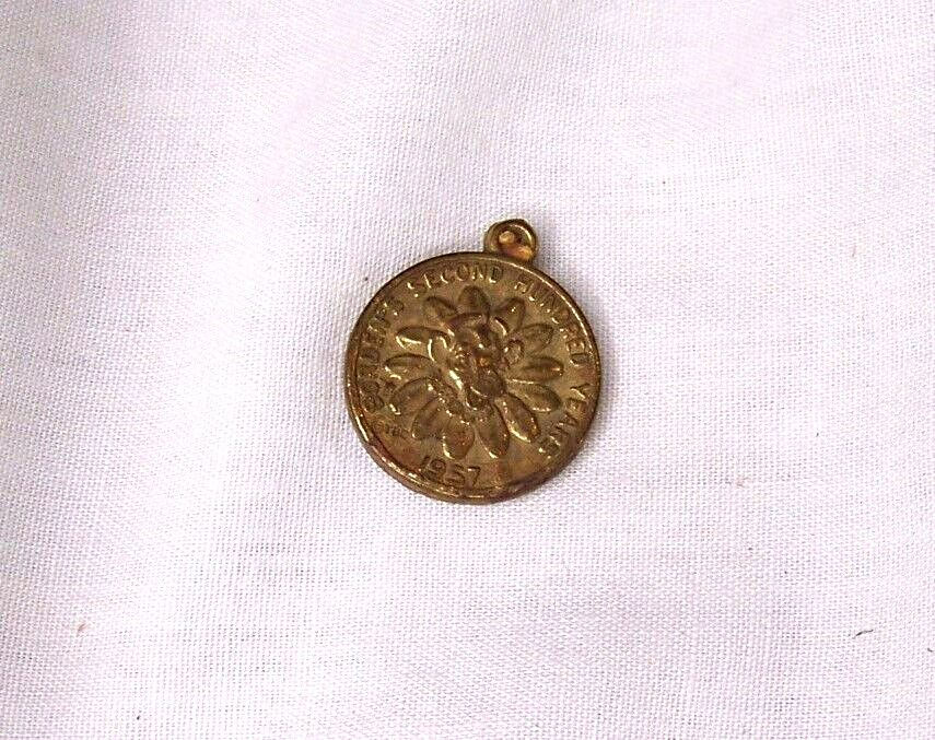 1957 BORDEN’S DAIRY SECOND HUNDRED YEARS PENDANT GAIL BORDEN TOKEN