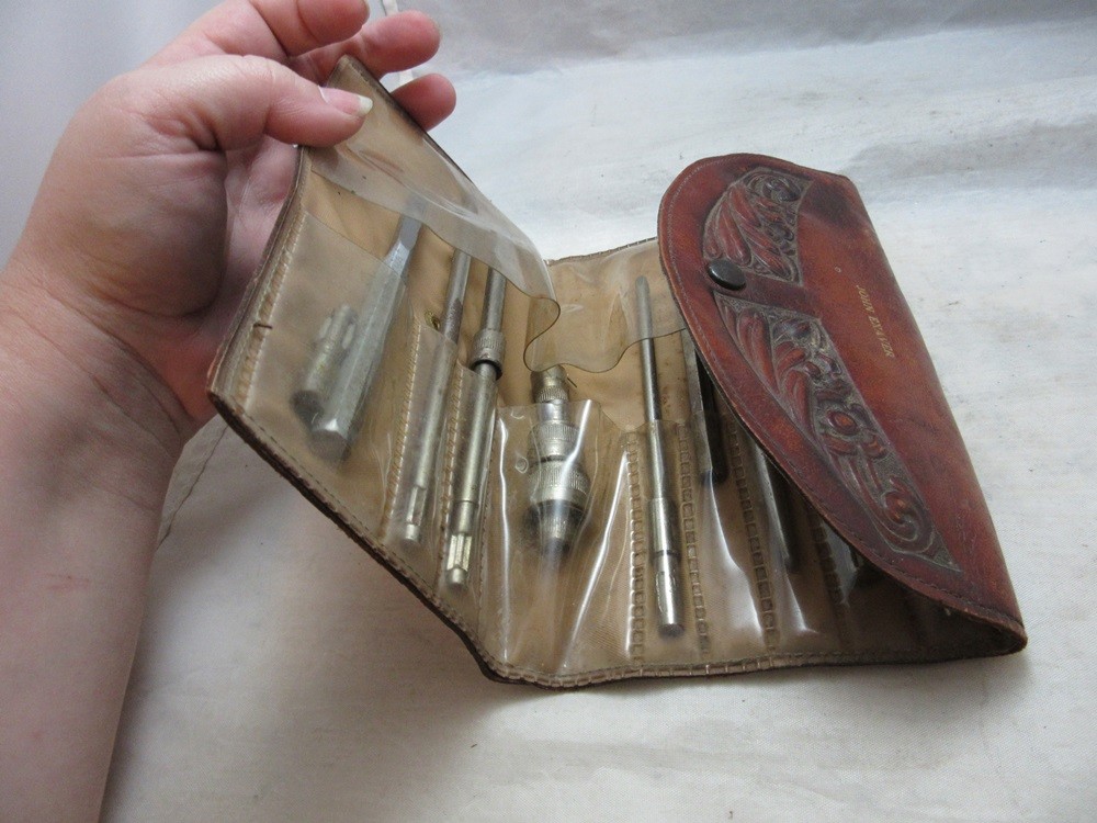 Farmers Mutual Liability Co. advertising leather case for punches