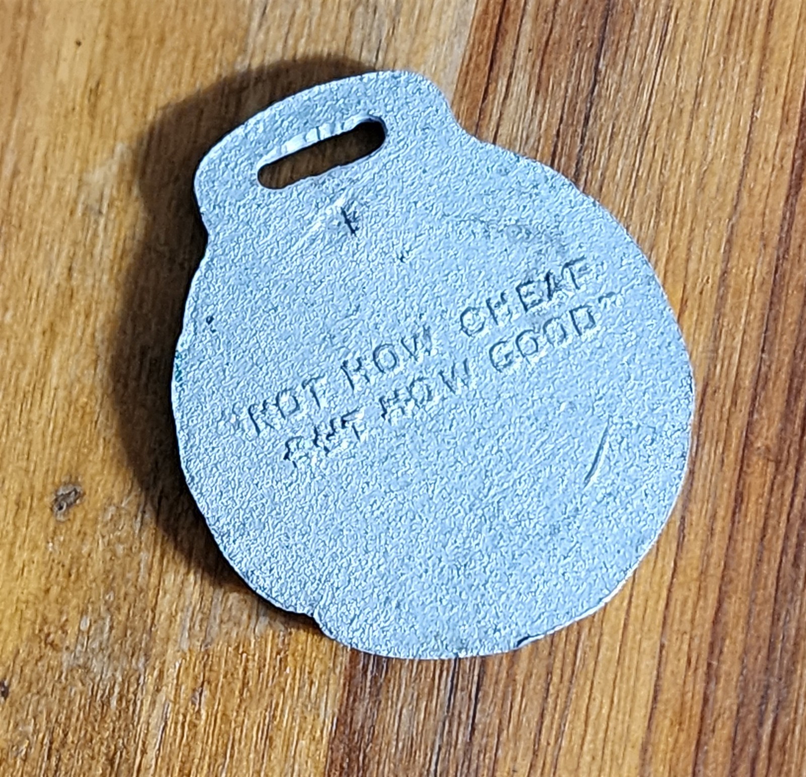 ANTIQUE JOLIET CORN SHELLERS METAL WATCH FOB NOT HOW CHEAP BUT HOW GOOD 1-5/8″