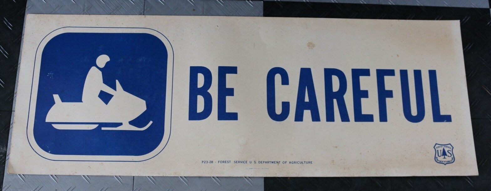 Vintage 1977 U.S. Department of Agriculture 44″ x 16″ cardboard sign snowmobile