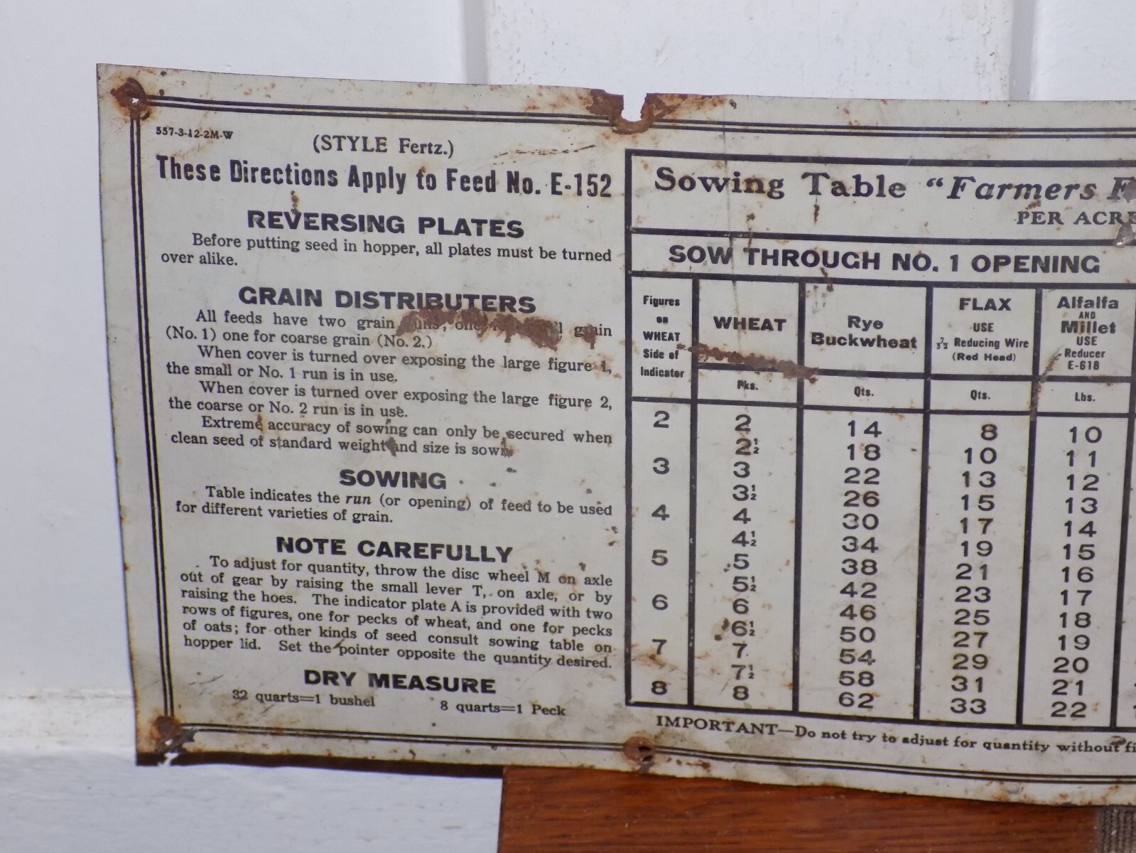 Vintage Grain Drill Sewing Table Tin Sign