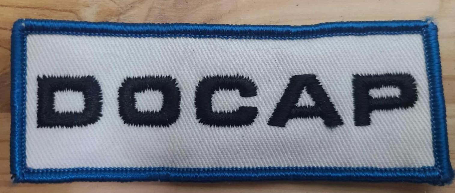 “Vintage DO CAP Embroidered Patch with Blue Border – Collectible Fabric Badge”