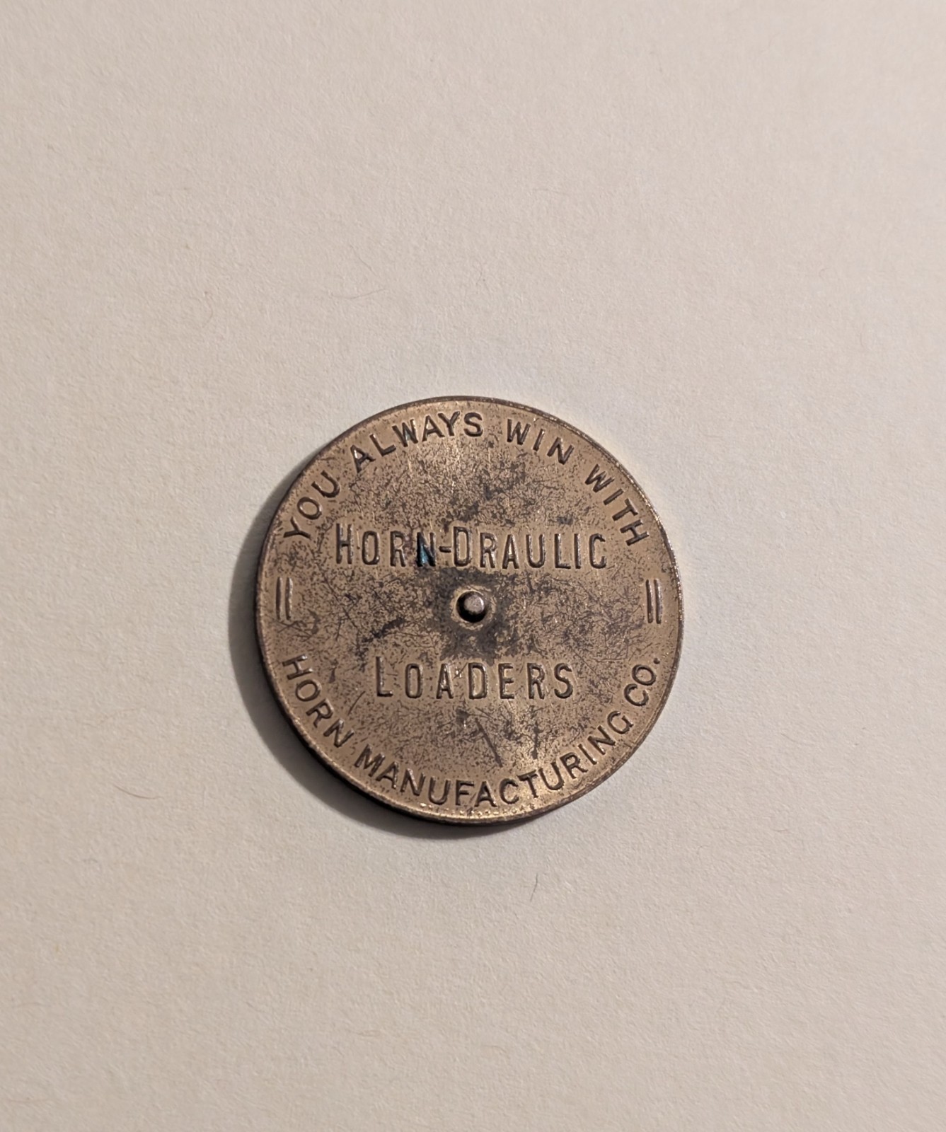 Horn-Draulic Loaders Spinning Token – Round & Round – Vtg Farm Equipment Coin Ad
