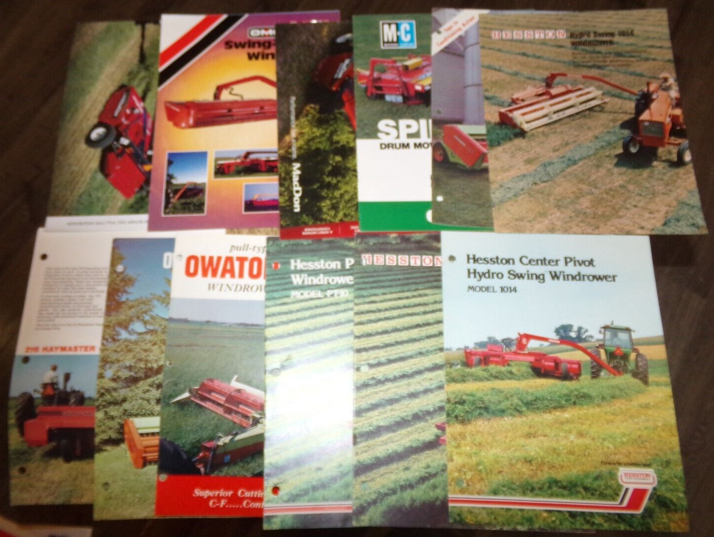 12-lot 1960’s-2010’s pull type windrower brochures in nice shape used