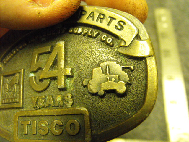 TISCO Tractor Implement Supply Co “All Makes” Tractor Parts, 54 years Belt Buckl