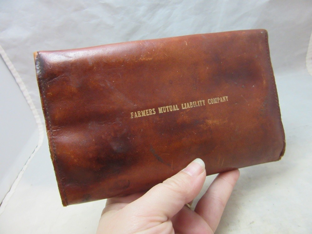 Farmers Mutual Liability Co. advertising leather case for punches