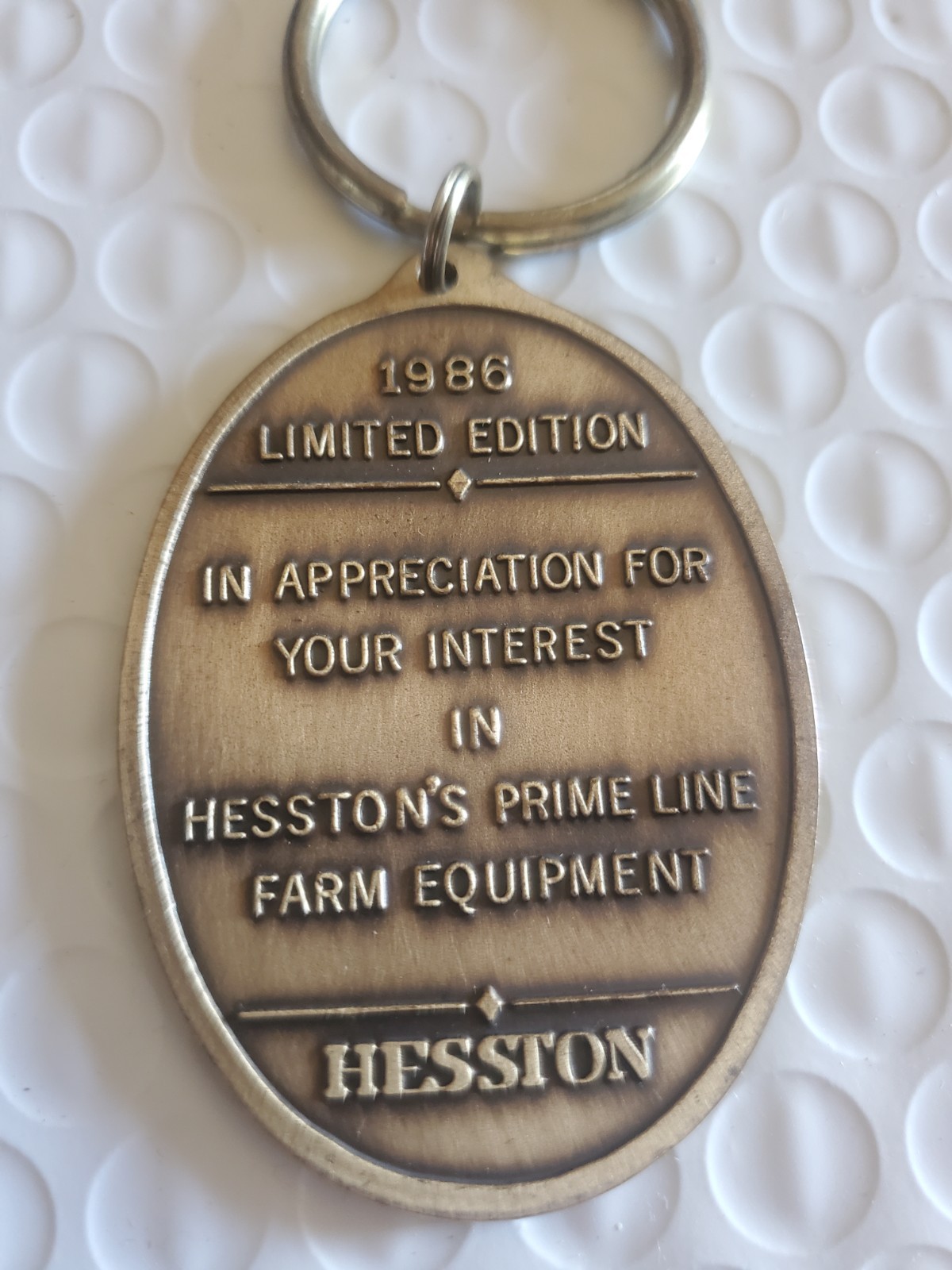 Vintage 1986 Hesston’s The Prime Line Equipment Key Chain vtg.