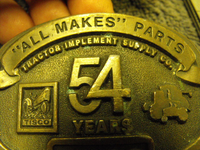 TISCO Tractor Implement Supply Co “All Makes” Tractor Parts, 54 years Belt Buckl