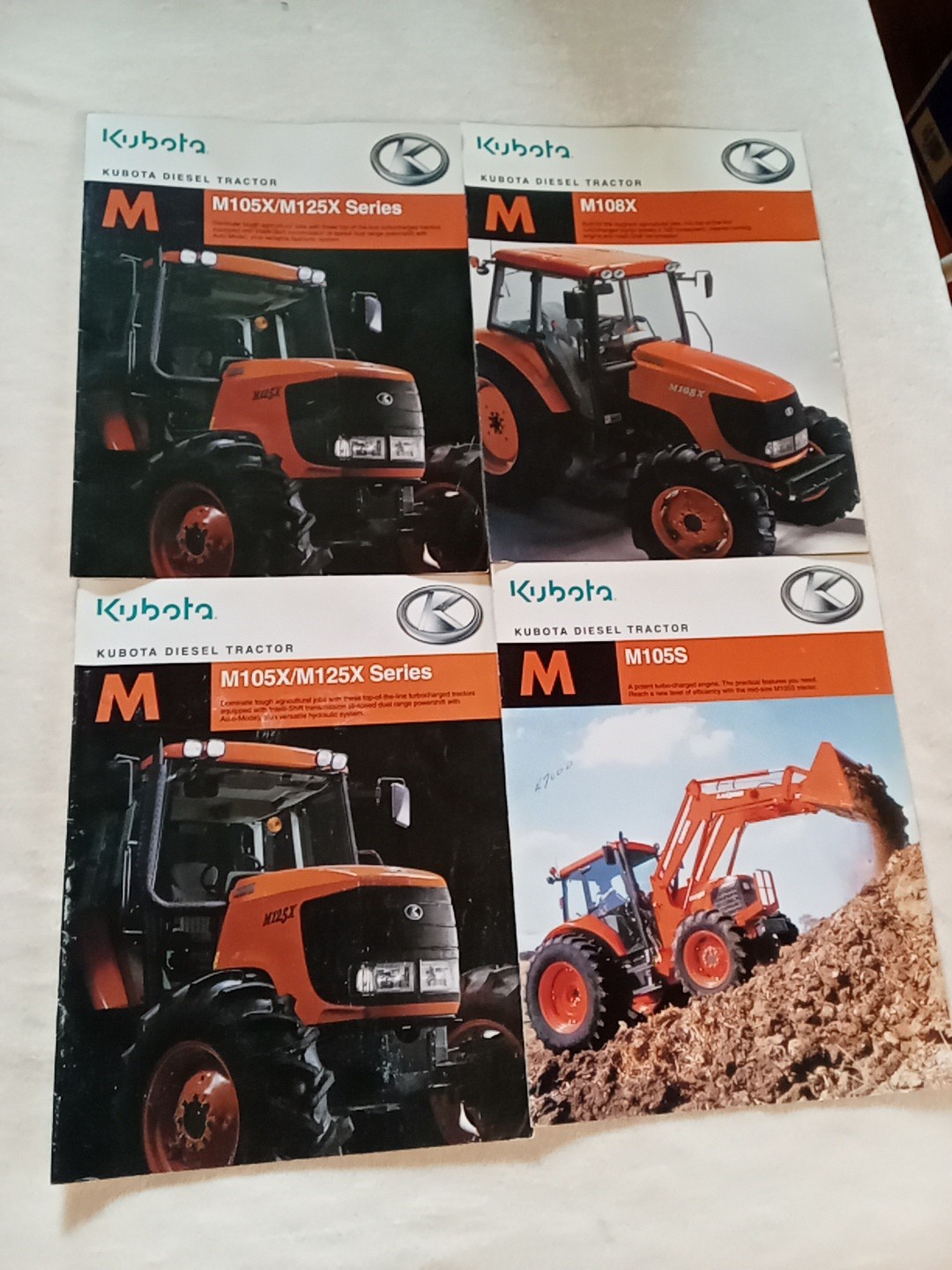 Lot 4 KUBOTA DIESEL TRACTOR SALES BROCHURE 2007 M105s, M108x,M105x,M125x Books