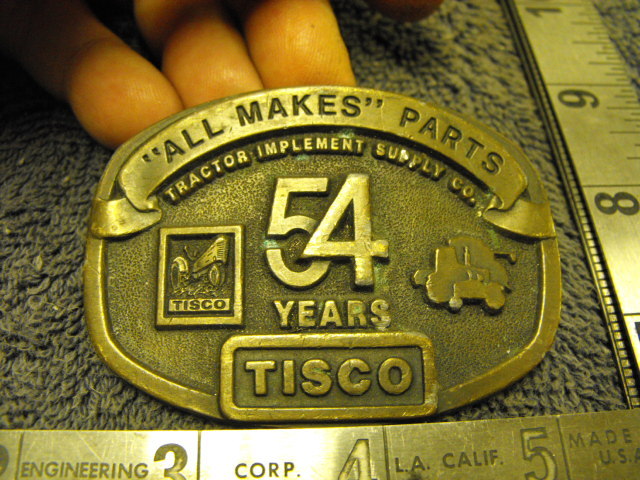 TISCO Tractor Implement Supply Co “All Makes” Tractor Parts, 54 years Belt Buckl