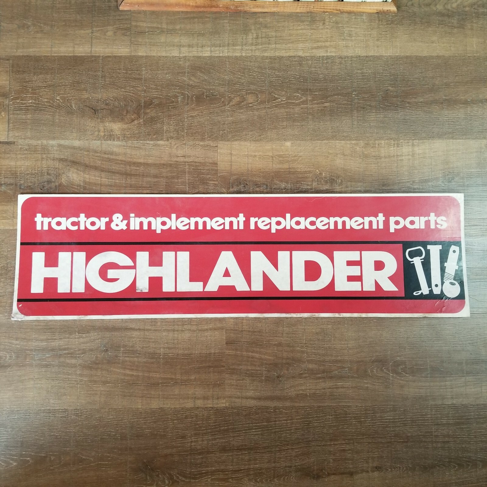 Vintage Cardboard Sign HIGHLANDER Tractor & Implement Replacement Parts 36 x 10″