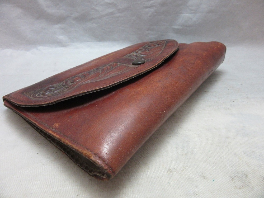 Farmers Mutual Liability Co. advertising leather case for punches