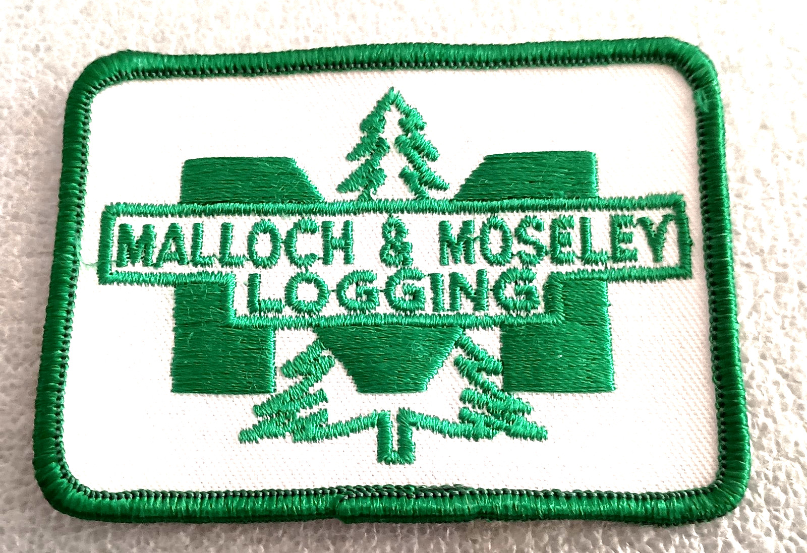 VTG Malloch & Moseley Logging Co. Canadian Cloth Jacket Hat Patch New NOS 1970s